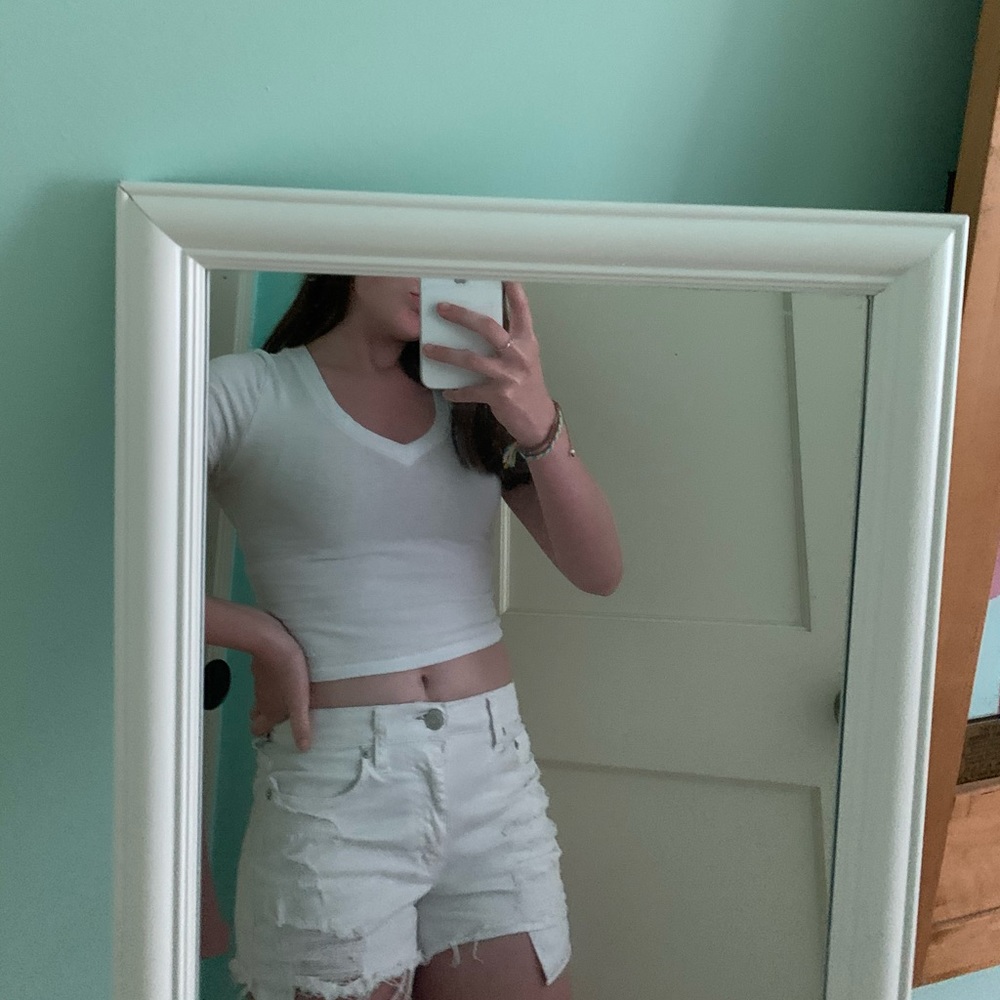 white ripped jean shorts